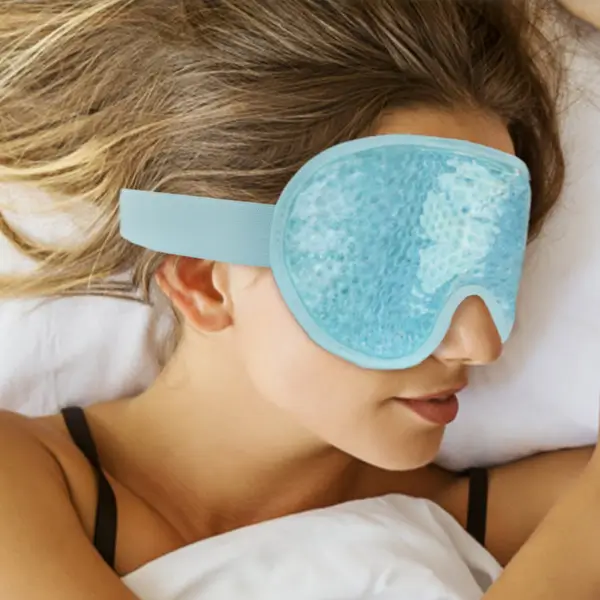 Relaxed scene showing eye mask, shoulder wrap and wine cooler sleeve in everyday use